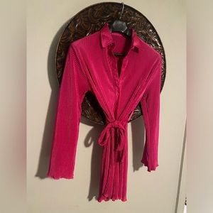 Fuschia crinkle fabric shirt dress.